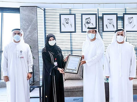 Dubai’s Roads and Transport Authority (RTA) officials receiving award from the Norwegian DNV.GL, for protecting passengers from COVID-19. 