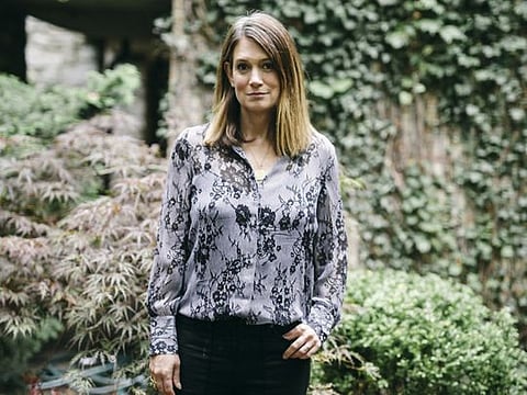 Author Gillian Flynn at her home in Chicago, Sept. 9, 2020. With “Utopia,” the best-selling novelist makes her debut as a TV showrunner, but anyone who knows her from “Gone Girl” or “Sharp Objects” might be surprised by what they see. (Lawrence Agyei/The New York Times)