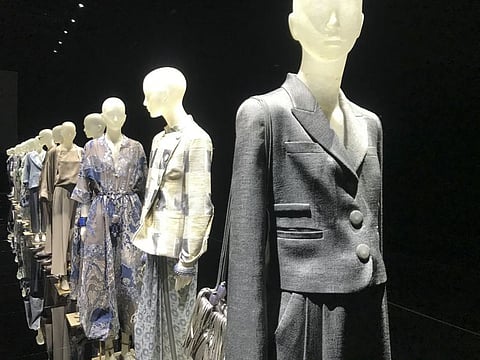 Creations displayed at a presentation as part of the Giorgio Armani 2021 women’s spring-summer ready-to-wear collection during the fashion week in Milan, Italy, Saturday, Sept. 26, 2020.
