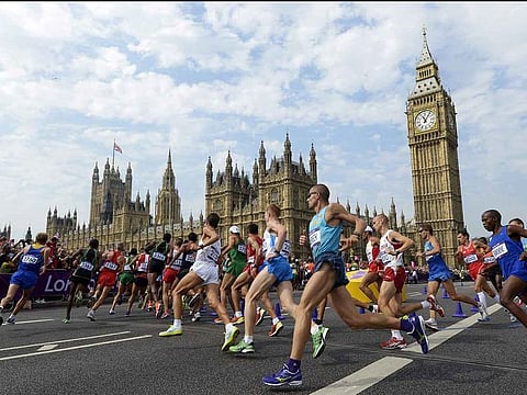 In this file photo taken on August 12, 2012 Athletes run in front of Big Ben and the Palace of Westminster during the men's marathon at the London 2012 Olympic Games.