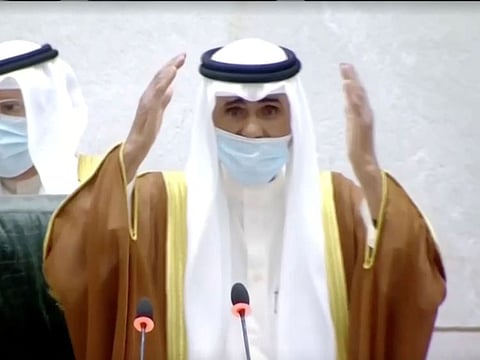 Kuwait's new Emir Sheikh Nawaf gestures as he takes the oath of office at the parliament, in Kuwait City on September 30, 2020, in this still image taken from a video. 