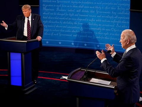 U.S. President Donald Trump and Democratic presidential nominee Joe Biden participate in their first 2020 presidential campaign debate held on the campus of the Cleveland Clinic at Case Western Reserve University in Cleveland, Ohio, U.S., September 29, 2020. 