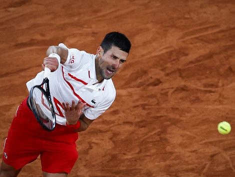 Serbia's Novak Djokovic serves the ball to Sweden's Mikael Ymer during their men's singles first round tennis match at the French Open.