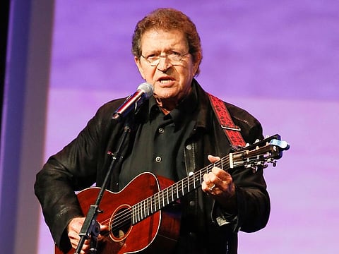 Musician Mac Davis performs at the Texas Film Awards in Austin, Texas on March 6, 2014. Davis, a country star and Elvis songwriter,   died on Tuesday, Sept. 29, 2020 after heart surgery.