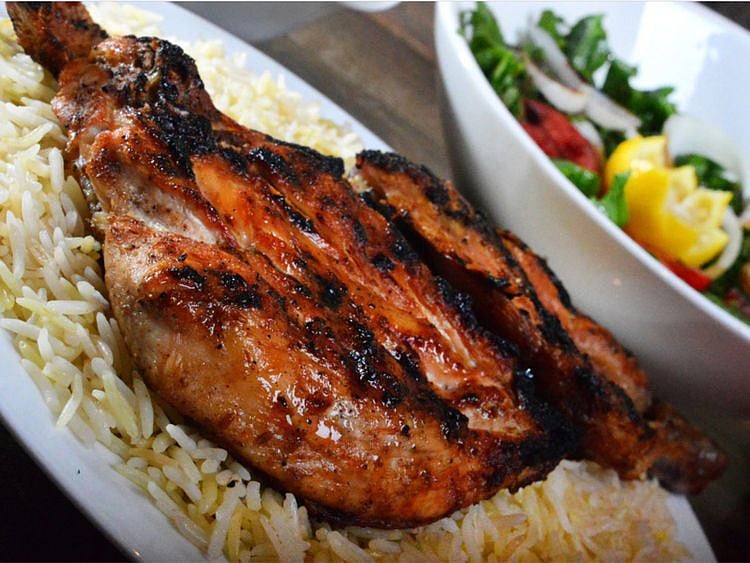 You can order a chicken madhbi from Qasr Saba on talabat