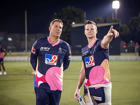 Hands-on: Shane Warne (left) was always at hand in his role as a mentor and brand ambassador for Rajasthan Royals.