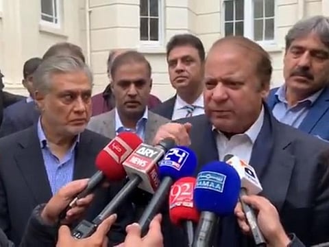 Nawaz Sharif speaks to the media in London.