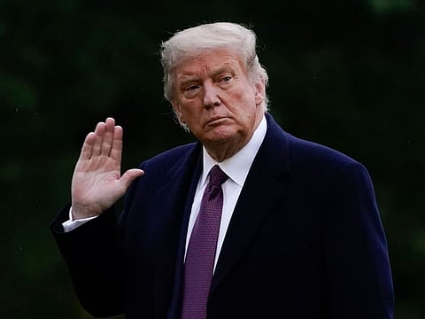 President Donald Trump walks from Marine One to the White House in Washington.