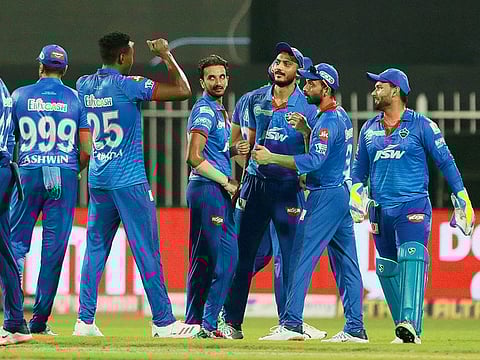 Delhi Capitals players celebrate the wicket of Nitish Rana of Kolkata Knight Riders. 