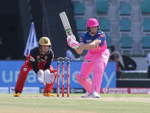 Jos Buttler of the Rajasthan Royals plays a shot against the Delhi Capitals at the Dubai International Stadium on October 14, 2020. 