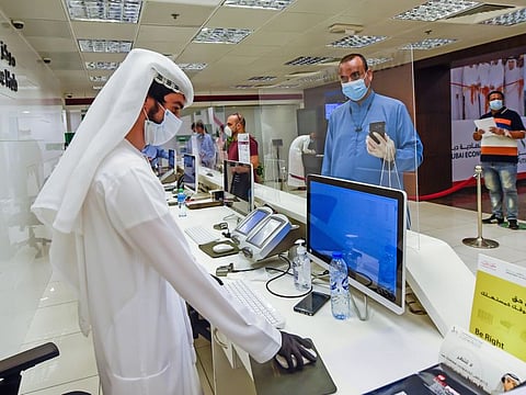 Visitors at the Welcome Hub in Amer Centre, Al Twar, in Dubai.