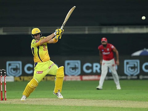 Shane Watson of the Chennai Super Kings drives against the Kings XI Punjab in Match 18 of IPL 2020 at the Dubai International Cricket Stadium on October 4, 2020.