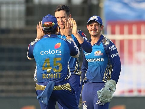 Trent Boult (centre) of Mumbai Indians celebrates the wicket of Kane Williamson of Sunrisers Hyderabad on Sunday.