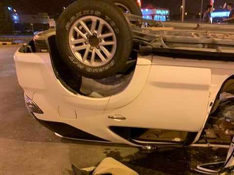 The youths escaped without any injuries after the vehicle, which was travelling at low speed, overturned at Al Thalatheen Roundabout