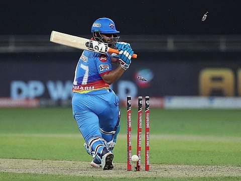 Rishabh Pant of Delhi Capitals is bowled during the match against RCB..
