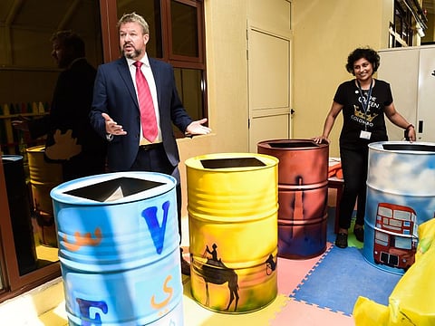 Keith Sykes, headteacher of Victoria English School in Sharjah with artist and curator Yoshita Ahmed showcasing the school's innovative sinks