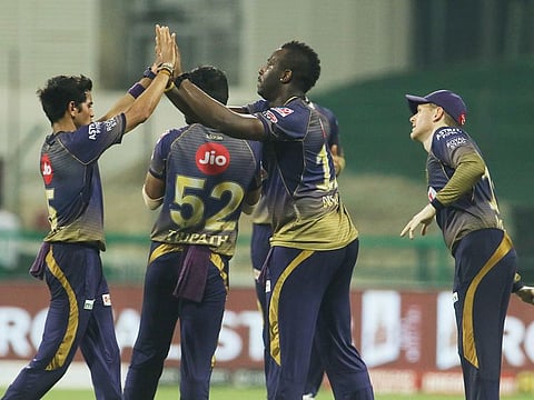 Kolkata Knight Riders players celebrate the wicket of Sam Curran of Chennai Superkings. 
