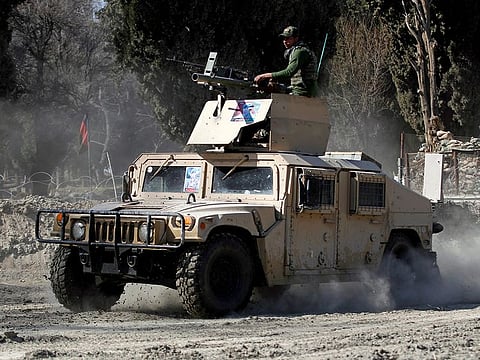 An armoured vehicle patrols near the side of an incident where two U.S soldiers were killed a day before in Shirzad district of Nangarhar province, Afghanistan February 9, 2020.