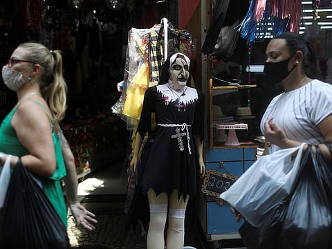 People walk around the Saara street market, amid the outbreak of the coronavirus disease (COVID-19), in Rio de Janeiro, Brazil, October 7, 2020.