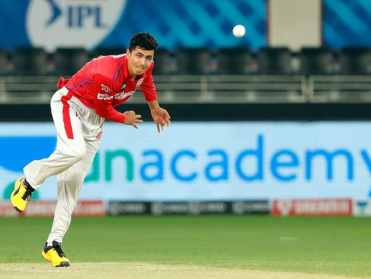 Mujeeb Ur Rahman of Kings XI Punjab bowls during the match. 