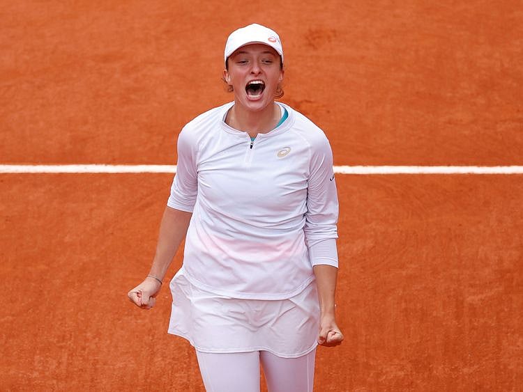Poland's Iga Swiatek celebrates after winning the French Open final against Sofia Kenin 