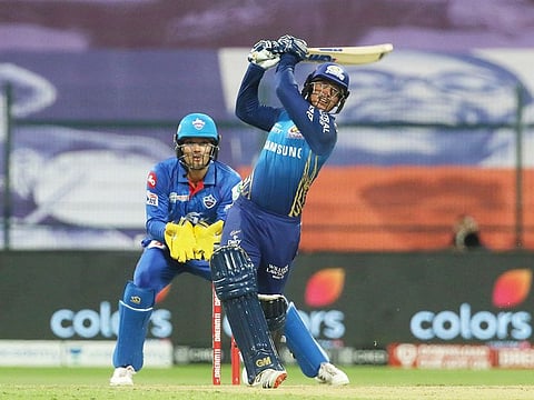 Quinton de Kock of the Mumbai Indians lofts down the field against the Delhi Capitals in the IPL 2020 game in Abu Dhabi on October 11, 2020.