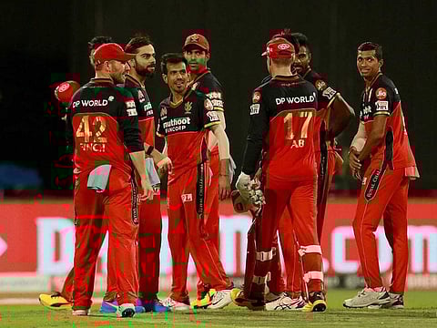 Virat Kohli captain of Royal Challengers Bangalore with team mates after winning the match.