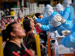 Photos: Nearly half of Chinese city of 9 million swabbed for COVID-19 in two days