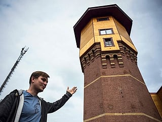 Look: Man who lives in a water tower turned apartment