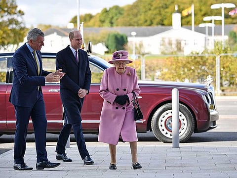 Britain's Queen Elizabeth and Prince William speak with Dstl Chief Executive Gary Aitkenhead at the Energetics Analysis Centre during a visit to Dstl at Porton Science Park near Salisbury, Britain October 15, 2020.