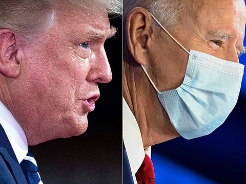 This combination of pictures created on October 15, 2020 shows US President Donald Trump gestures as he speaks during an NBC News town hall event at the Perez Art Museum in Miami on October 15, 2020, and Democratic Presidential candidate and former US Vice President Joe Biden participates in an ABC News town hall event at the National Constitution Center in Philadelphia on October 15, 2020.