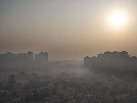 Morning haze envelops the skyline on the outskirts of New Delhi, India, Friday, Oct. 16, 2020. The national capital, one of the world’s most polluted cities, enjoyed a respite from air pollution up until September due to a strict virus lockdown. But now with the onset of winter leading to the dying down of winds and industrial activities resuming and cars back on the roads, the air quality in the city has once again fallen to poor levels. 