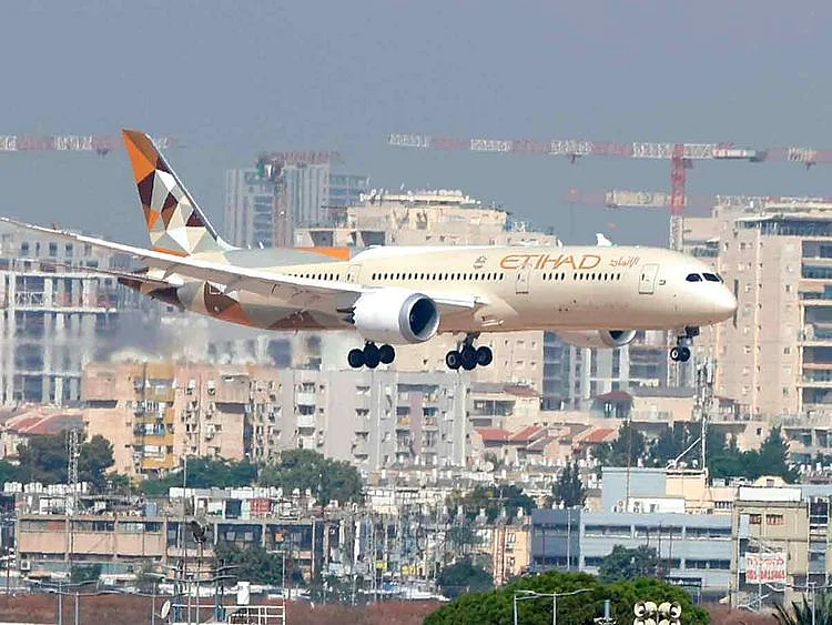 An Etihad Airways plane carrying a delegation from the UAE on a first official visit, lands at Israel's Ben Gurion Airport near Tel Aviv, on October 20, 2020. 