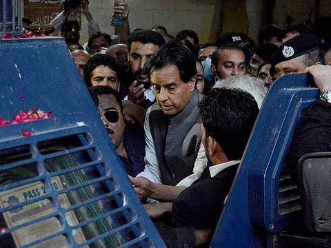 Mohammad Safdar, centre, son-in-law of former Pakistani Prime Minister Nawaz Sharif, leaves after a court granted him bail, in Karachi, Pakistan, Monday, Oct. 19, 2020. Pakistani police briefly detained Safdar on Monday, accusing him of leading a crowd in a chant against the military at the tomb of the country's founder. 