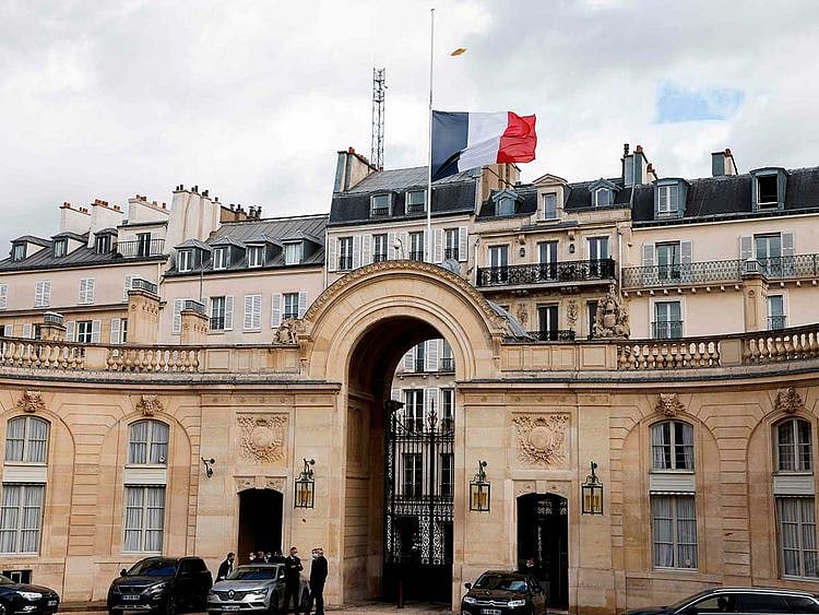 French flag flying at half-mast at the Elysee palace in Paris France