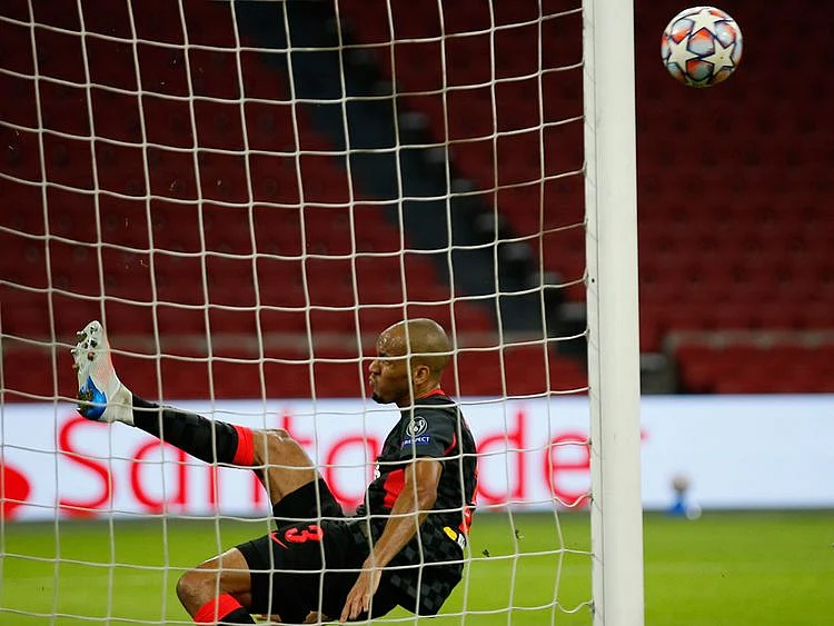 Fabinho clears off the line for Liverpool against Ajax