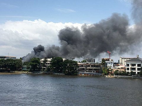 A general view of smoke rising from the Ikoyi prison that is on fire in Lagos on October 22, 2020. Gunshots could be heard on October 22, 2020 and smoke was seen billowing from a prison in central Lagos as fresh unrest rocked Nigeria's biggest city after the shooting of protesters.