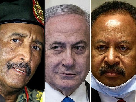 From left: The President of the Sudanese Transitional Council General Abdel Fattah Al Burhan; Israeli Prime Minister Benjamin Netanyahu; and Sudan's Prime Minister Abdullah Hamdok.