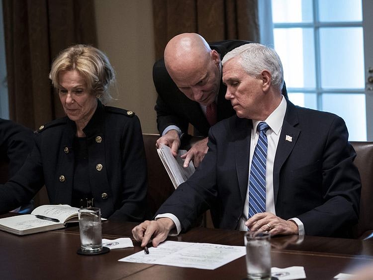 The vice president’s chief of staff, Marc Short (centre) has tested positive. 