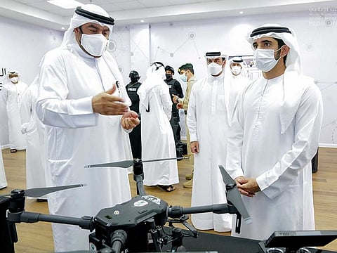 Sheikh Hamdan briefed during inauguration of the command room in Dubai.
