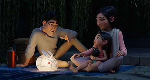 Father (voiced by John Cho), Fei Fei (voiced by Cathy Ang) and Mother (voiced by Ruthie Ann Miles) in 'Over the Moon'.