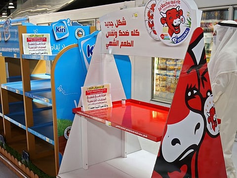 A picture shows supermarket shelves empty of French products in Kuwait City on October 23, 2020, in protest of cartoons depicting Islam's Prophet Mohammed (PBUH) published in the French media. 