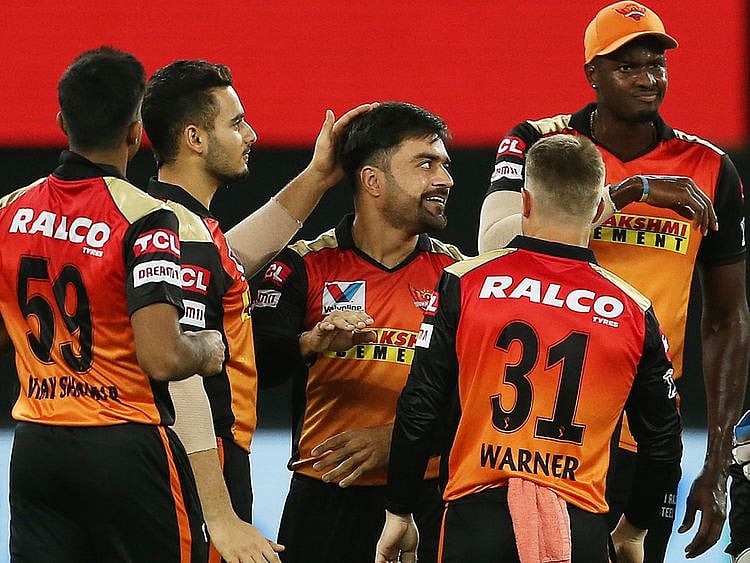 Rashid Khan (centre) of Sunrisers Hyderabad