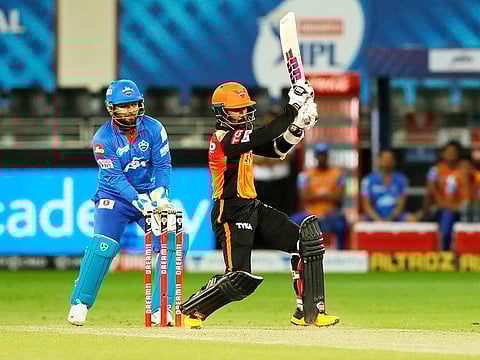 Wriddhiman Saha of Sunrisers Hyderabad hits a boundary during the match against Delhi Capitals on Tuesday night..  