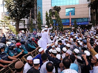 Tens of thousands protest over Macron remarks after France killings