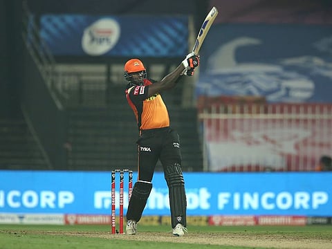 Jason Holder of Sunrisers Hyderabad hits a six.  