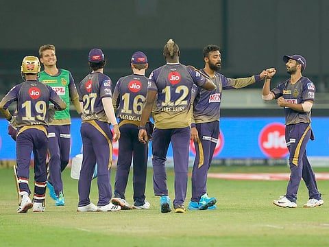 Kolkata Knight Riders players celebrate the wicket of Rahul Tewatia of Rajasthan Royals. 