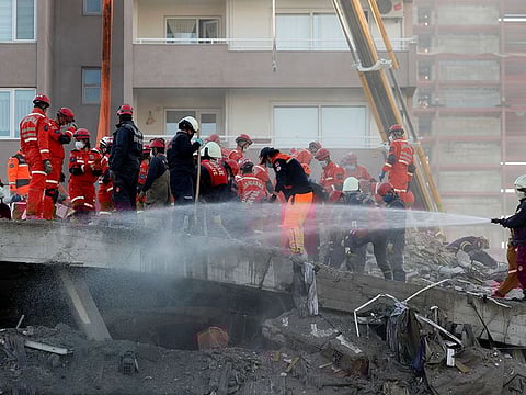 Rescue operations continue at a collapsed building after an earthquake in the Aegean port city of Izmir, Turkey, November 1, 2020.