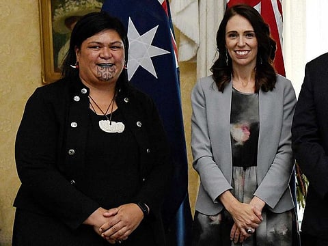This file photo taken on February 28, 2020 shows New Zealand's Prime Minister Jacinda Ardern (R) and New Zealand's then-Minister of Maori Development and Local Government (L) Nanaia Mahuta posing for photographs after the signing of the Indigenous Collaboration Arrangement with their Australian counterparts at Admiralty House in Sydney. Ardern named an "incredibly diverse" cabinet on November 2, 2020 that includes a foreign minister with a Maori facial tattoo.