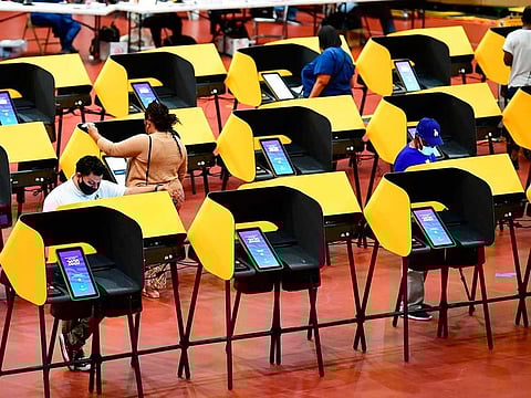 People vote on the last day of early voting for the 2020 US Elections at The Forum, the former home of the Los Angeles Lakers, on November 2, 2020 in Los Angeles, California. 